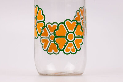 Pot en verre vintage de chez Meli avec son couvercle verseur orange