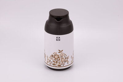Thermos vintage blanc et noir de chez Tiger en provenance du Japon avec un motif de fleurs rouges