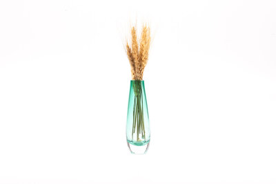 Petit vase bleu d'une hauteur de 16 cm