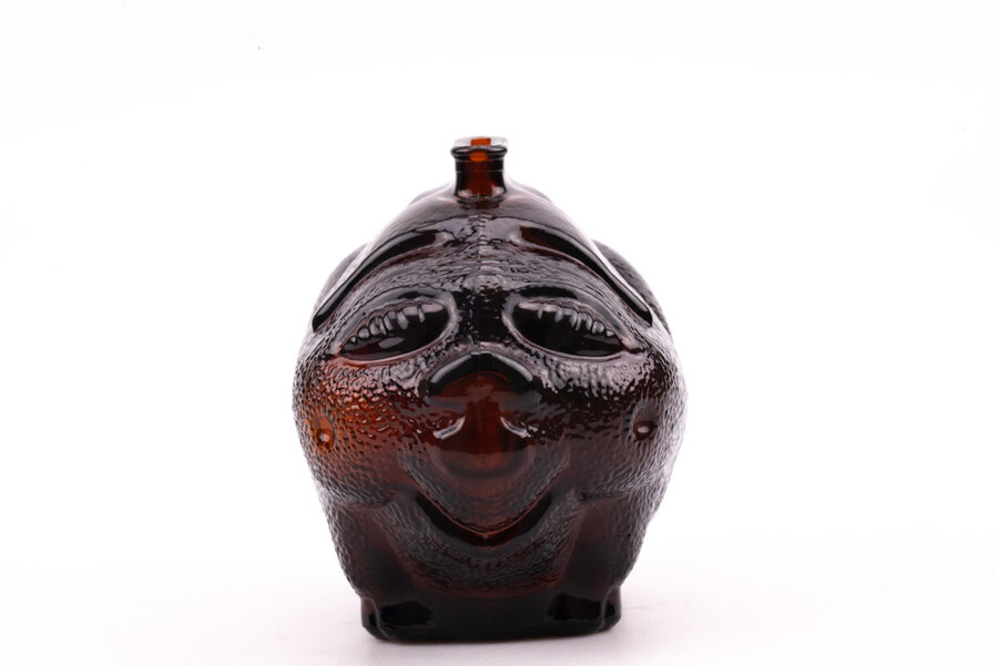 Ancienne tirelire en verre épais fumé. Elle est en forme de cochon plutôt fun.