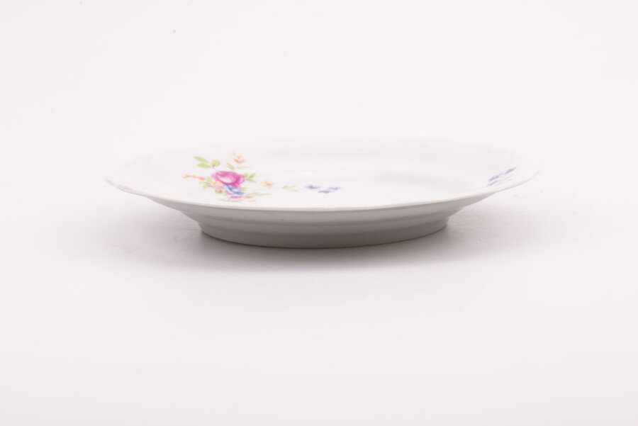 Assiette à dessert vintage en porcelaine blanche avec des motifs de fleurs bleues de la manufacture Chodziez