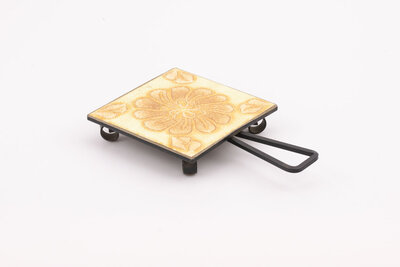 Dessous de plat vintage en porcelaine et fer