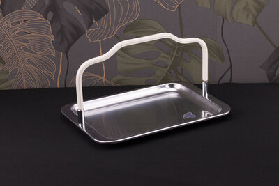 Plateau vintage en inox avec une hanse en plastique de chez Demeyere