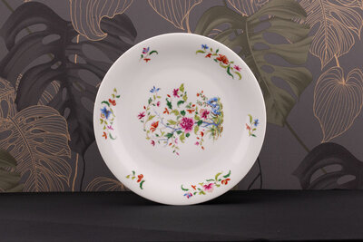 Grande assiette vintage en porcelaine de Limoges blanche avec des motifs fleuris