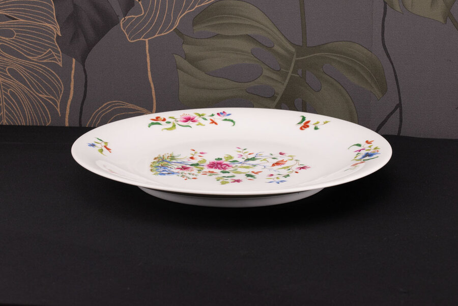 Grande assiette vintage en porcelaine de Limoges blanche avec des motifs fleuris