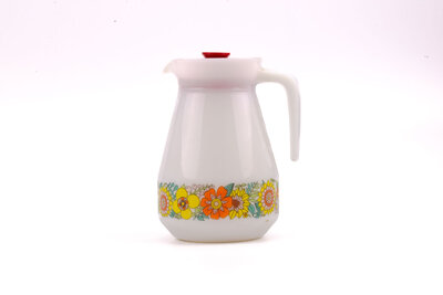 Carafe vintage blanche avec un motif floral sur son long de chez Schott Mainz 