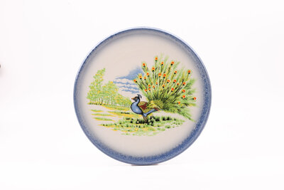 Grand plat avec paon en parfait état de la manufacture italienne Carm Ceramica