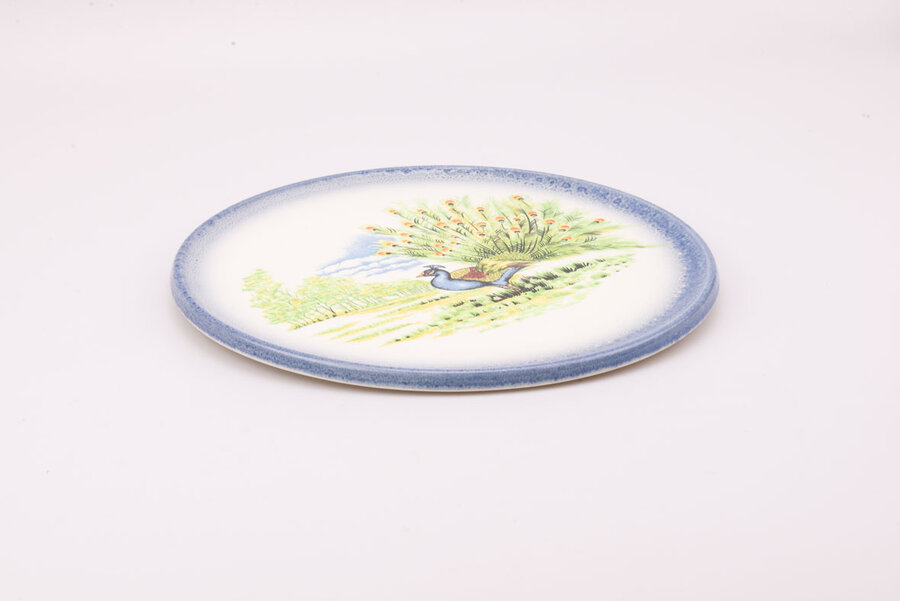 Grand plat avec paon en parfait état de la manufacture italienne Carm Ceramica