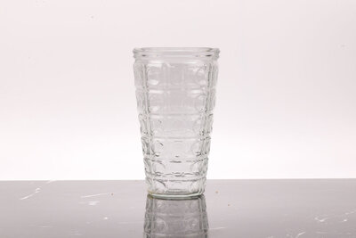 Vase vintage en verre moulé transparent