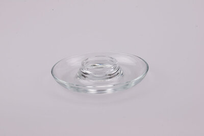 Un bougeoir en verre en parfait état à petit prix. 