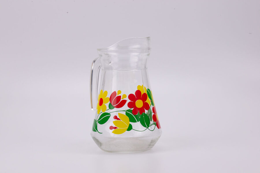 Mignonne carafe vintage en verre transparent avec motif à fleurs conçu en France dans les années 1980