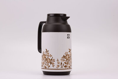 Thermos vintage blanc et noir de chez Tiger en provenance du Japon avec un motif de fleurs rouges