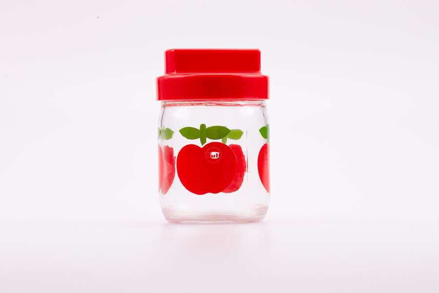 Petit bocal en verre transparent Gulf avec couvercle en plastique rouge à visser.