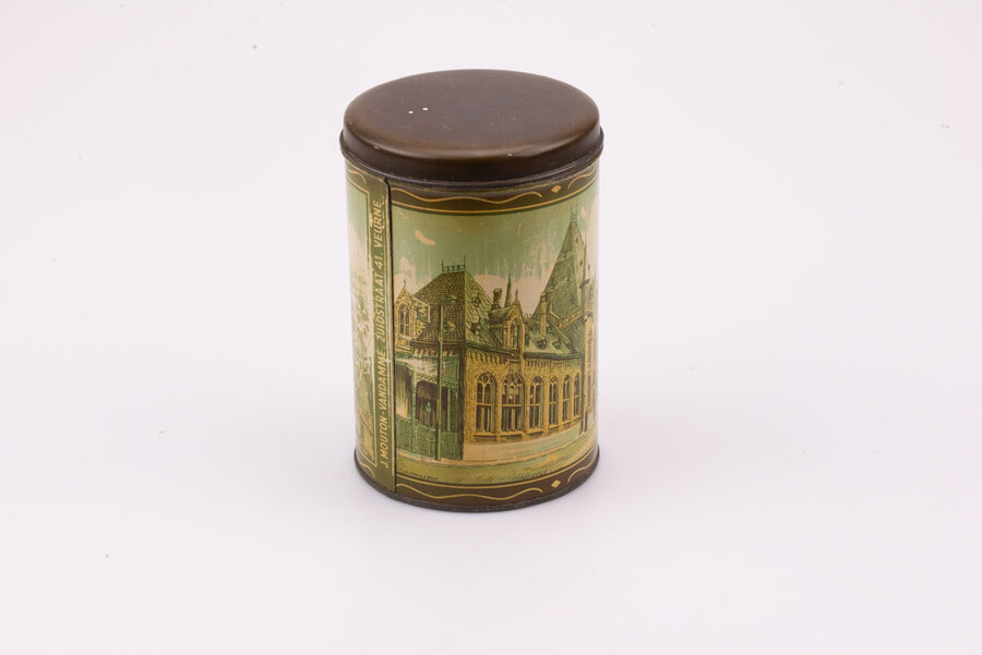 Ancienne boite en métal avec des teintes beiges et brunes de De Veurnsche Torens.