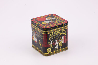 Ancienne boite en métal dans un style oriental avec des teintes noires, rouges et dorées de la marque R. Twining&co